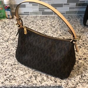 Slightly used Michael Kohrs Purse